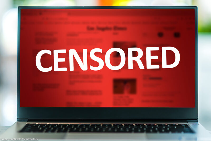 A laptop with the word "CENSORED" in white on a red background.