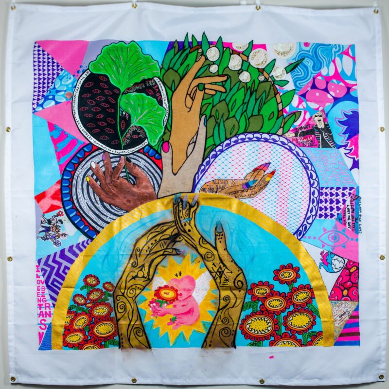 Connected hands surrounded by flowers & plants, pink + white + blue fabrics, 
