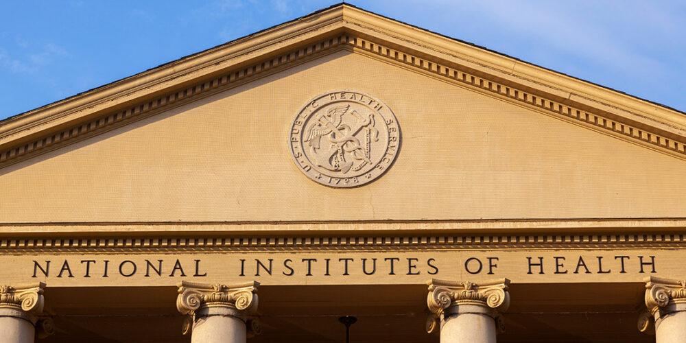 Exterior view of the main historic building of National Institutes of Health (NIH) inside Bethesda campus.