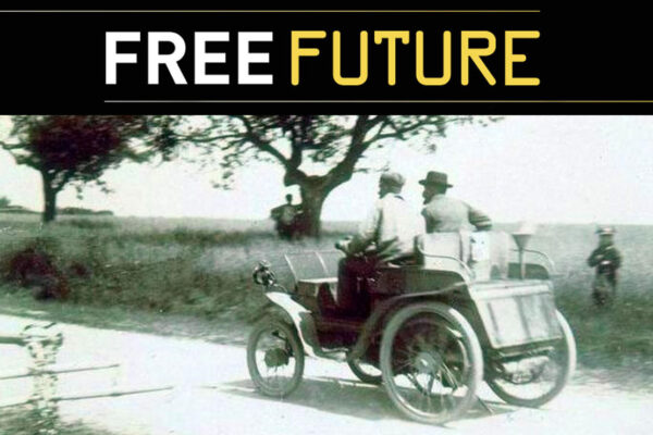 Vintage car driving along a road