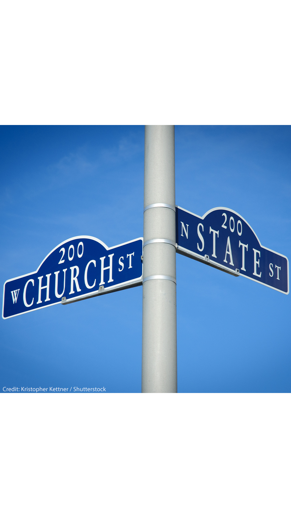 Two street signs at an intersection on a pole reading Church St on one and State St on the other.
