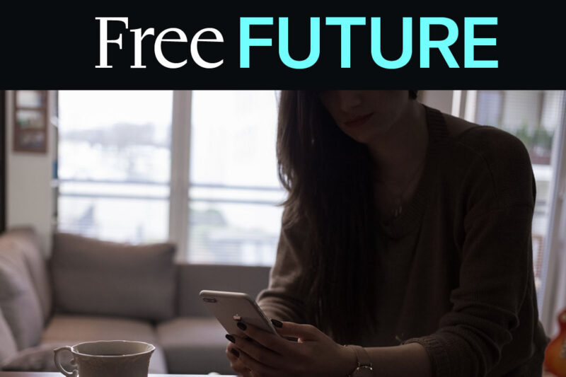 A woman looking at her mobile phone