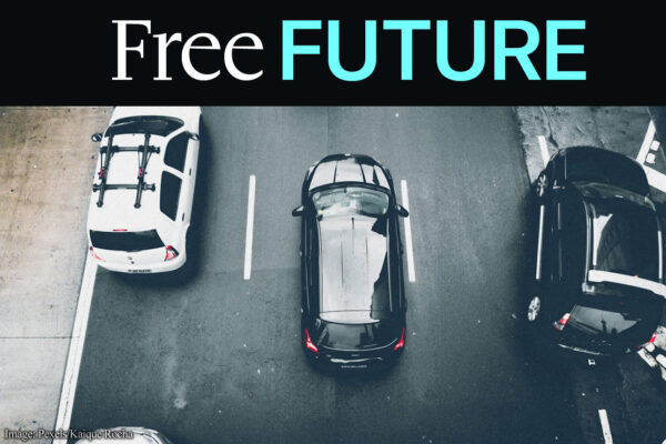 An aerial view of some vans on a street