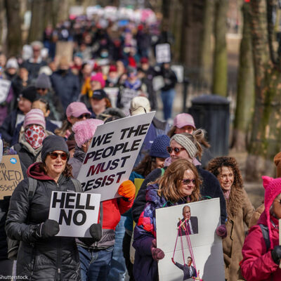 Demonstrators marching in celebration of International Women's Day.