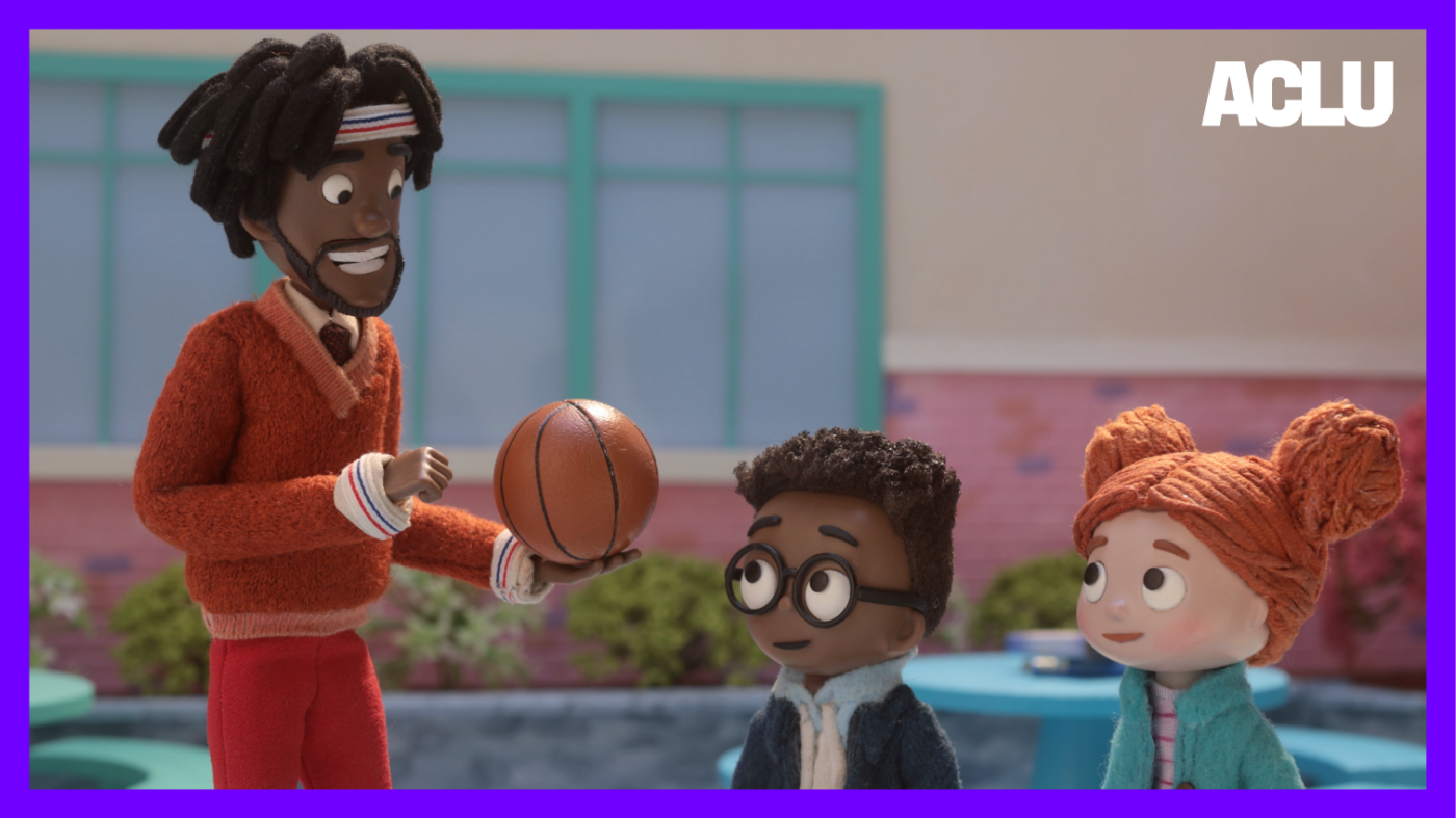 A still frame from episode 3: Mr. C is holding a basketball while talking to Aaron and Lisa about our branches of government!