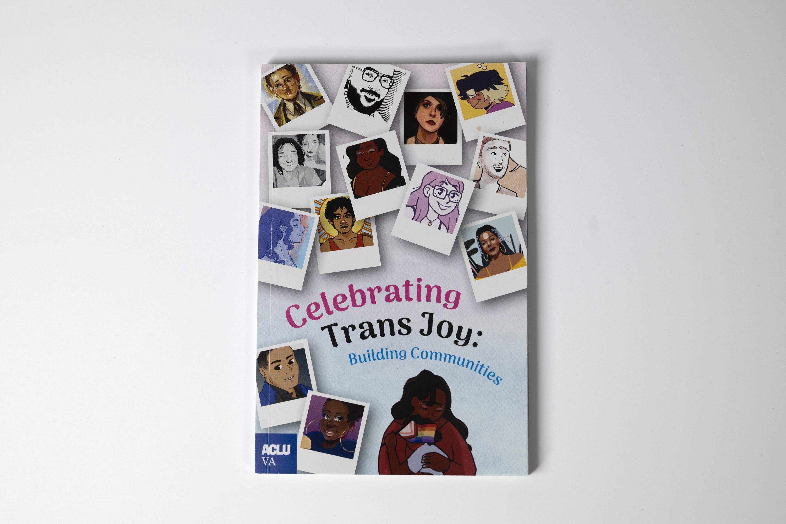 Zine cover featuring diverse cartoon faces and the text "Celebrating Trans Joy: Building Communities"