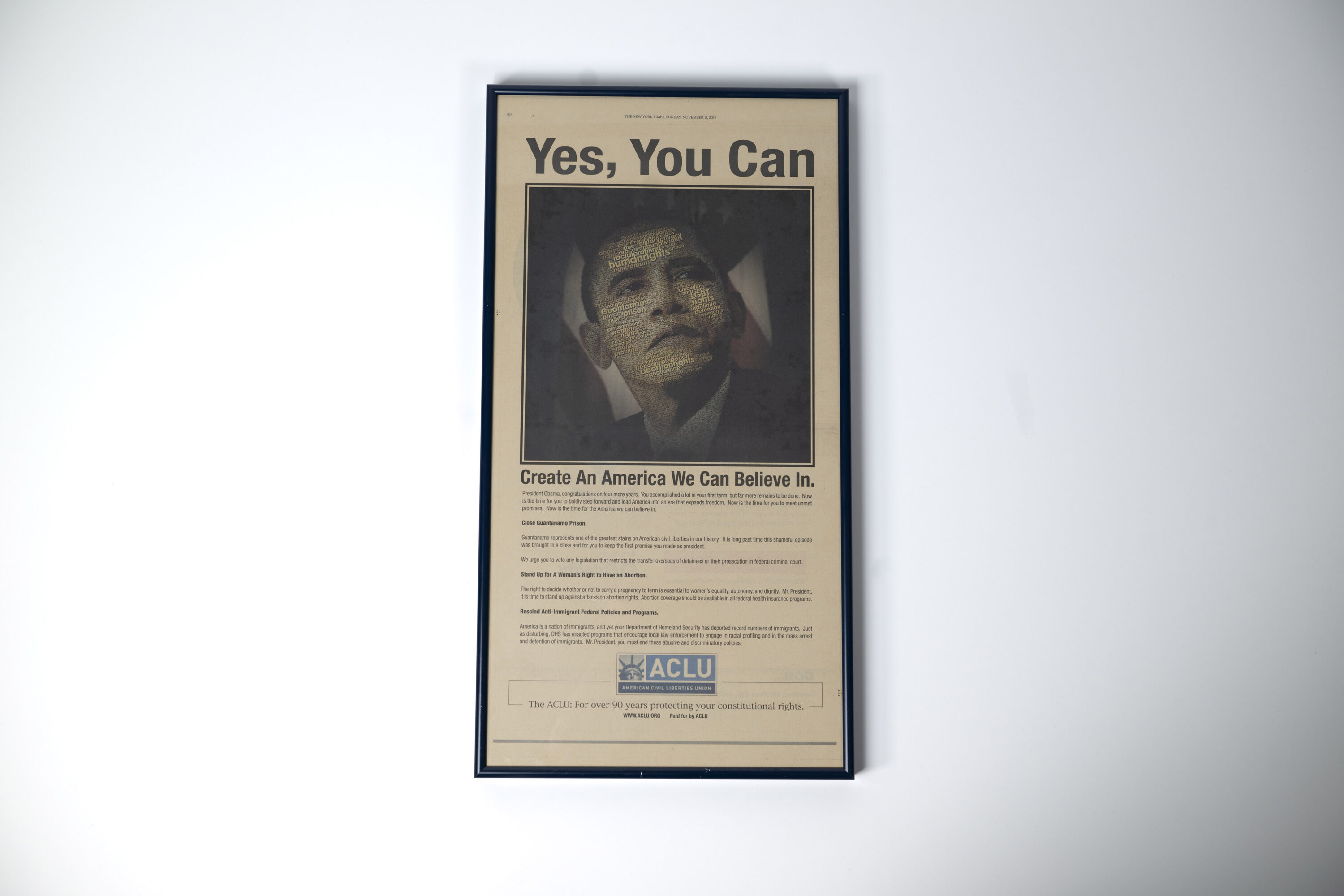 Photo of an ACLU ad featuring a photo of Barack Obama and text calling on him to "Create an America We Can Believe In"