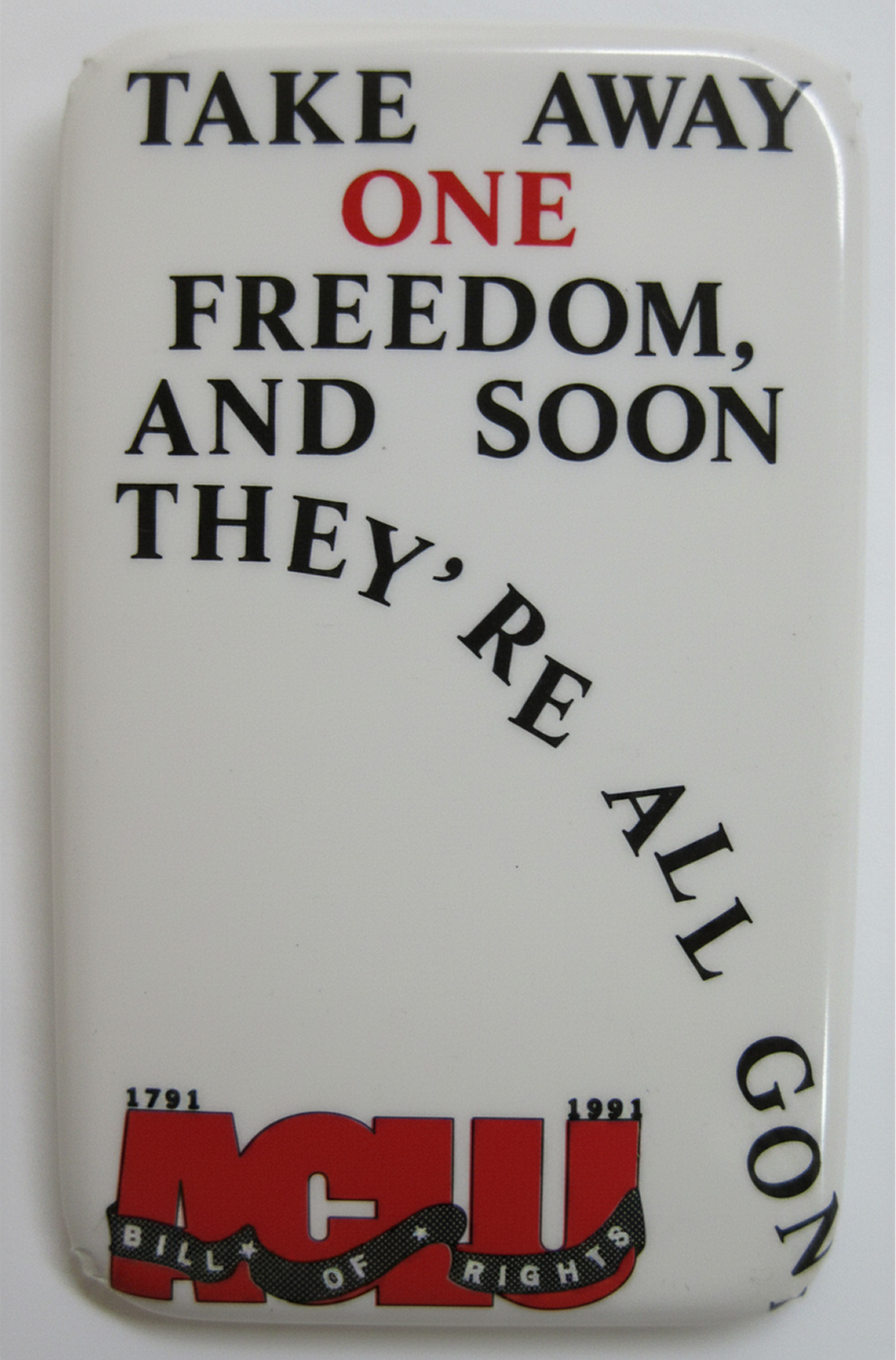 Photo of ACLU button reading: "Take away one freedom and soon they're all gone."
