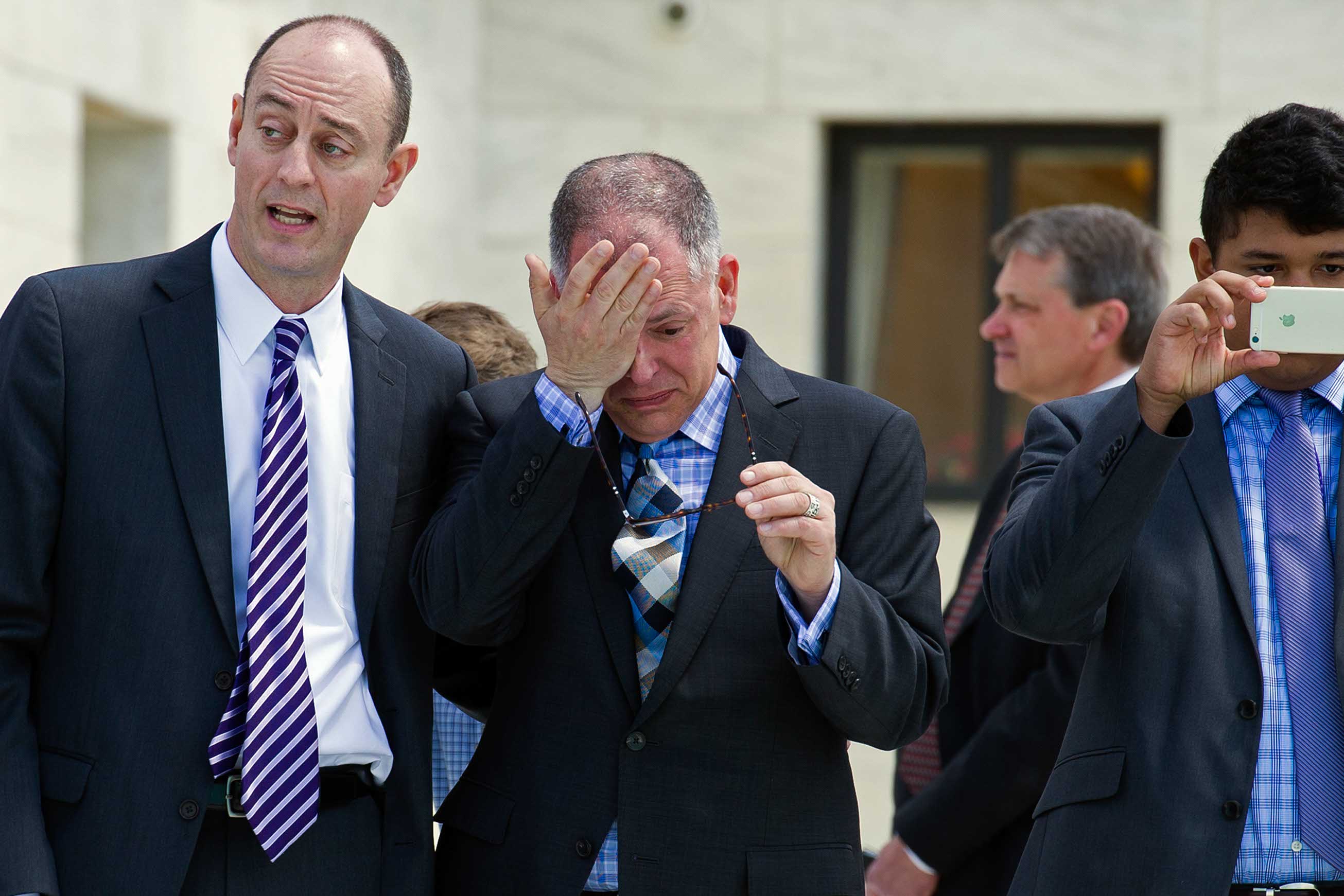 James Obergefell and James Esseks exit the Supreme Court