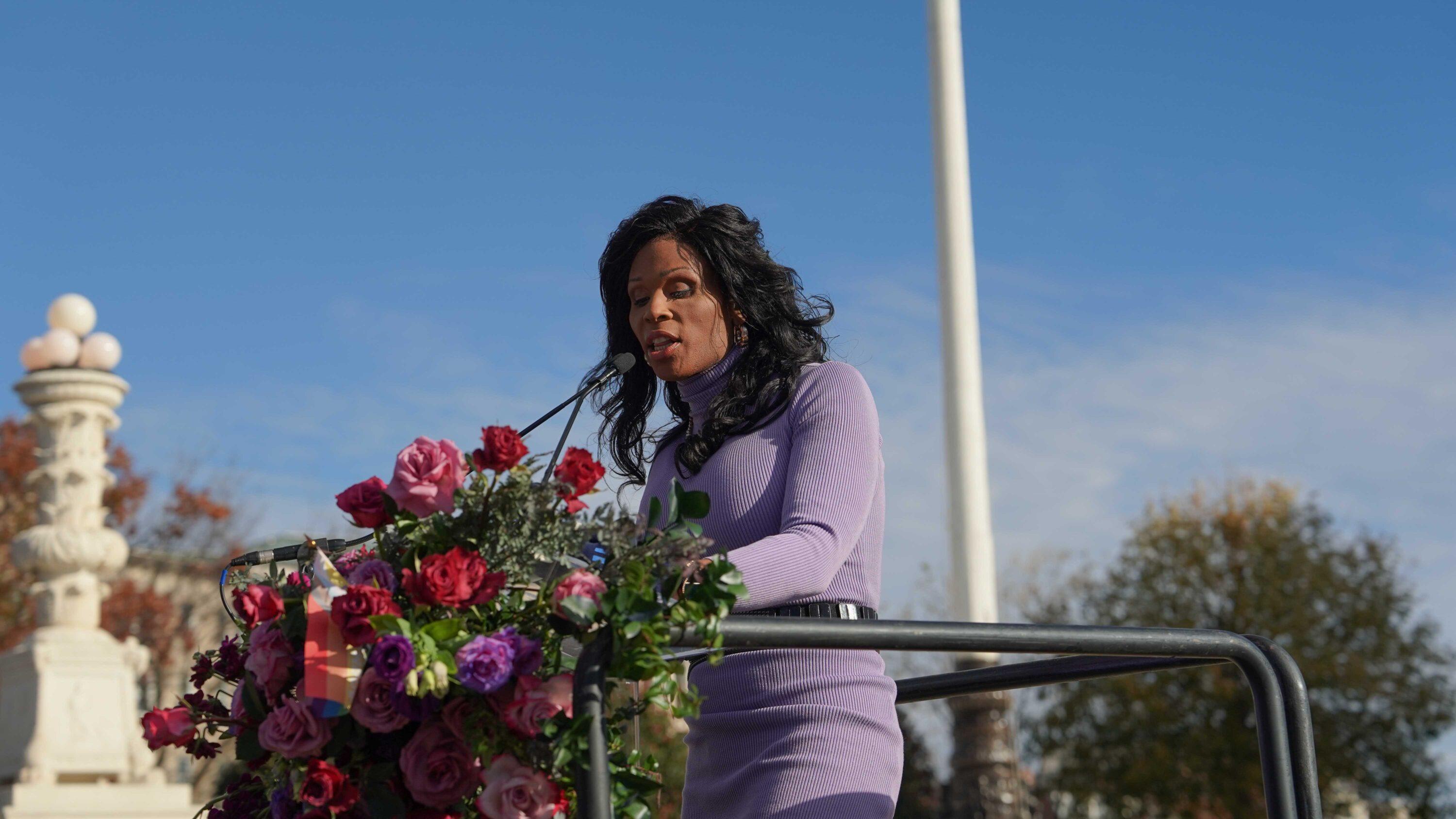 Peppermint speaks at a protest in support of care for transgender youth outside the Supreme Court