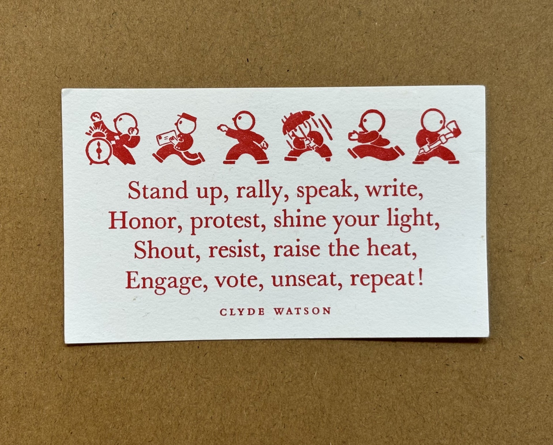 Photo of small card featuring a protest chant by Clyde Watson