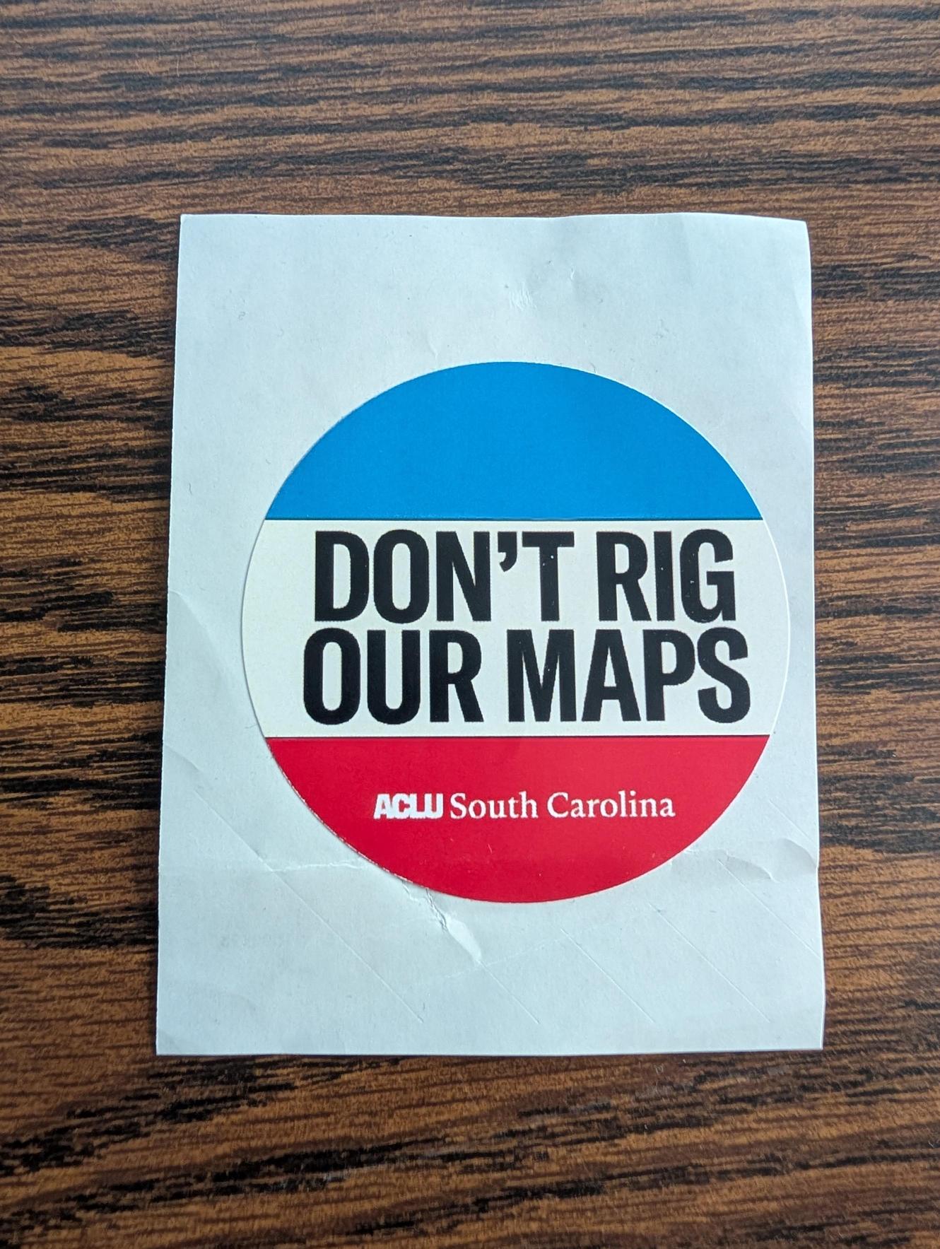 ACLU of South Carolina's Sticker reads "Don't Rig Our Maps"