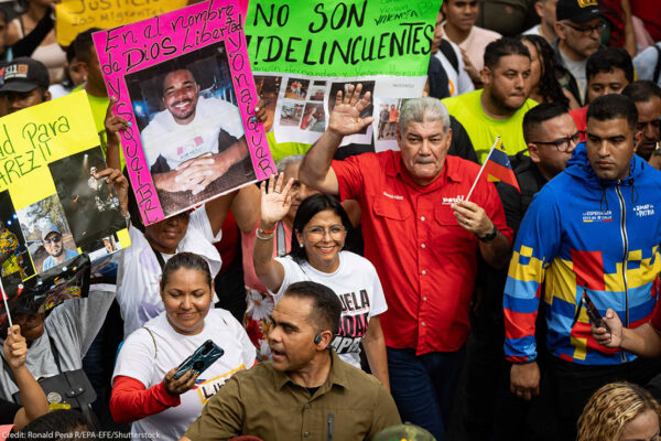 The vice president of Venezuela, Delcy Rodriguez (C), participates in a pro-government march in defense of Venezuelan migrants in Caracas, Venezuela, 18 March 2025. Venezuela demanded information about the migrants who were deported over the weekend from the US to El Salvador, under the Alien Enemies Act invoked by US President Donald Trump, which Caracas denounced as 'kidnapping', 'illegal' and 'a violation of human rights'.
