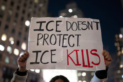 A protest sign that says "ICE Doesn't Protect, ICE Kills."