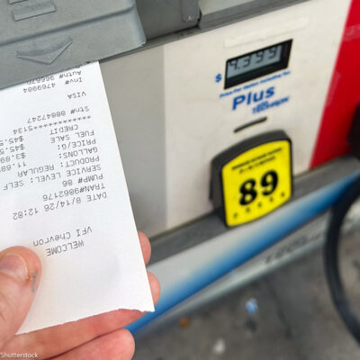 A customer pumps gasoline at a gas station in South Florida as fuel prices remain elevated.